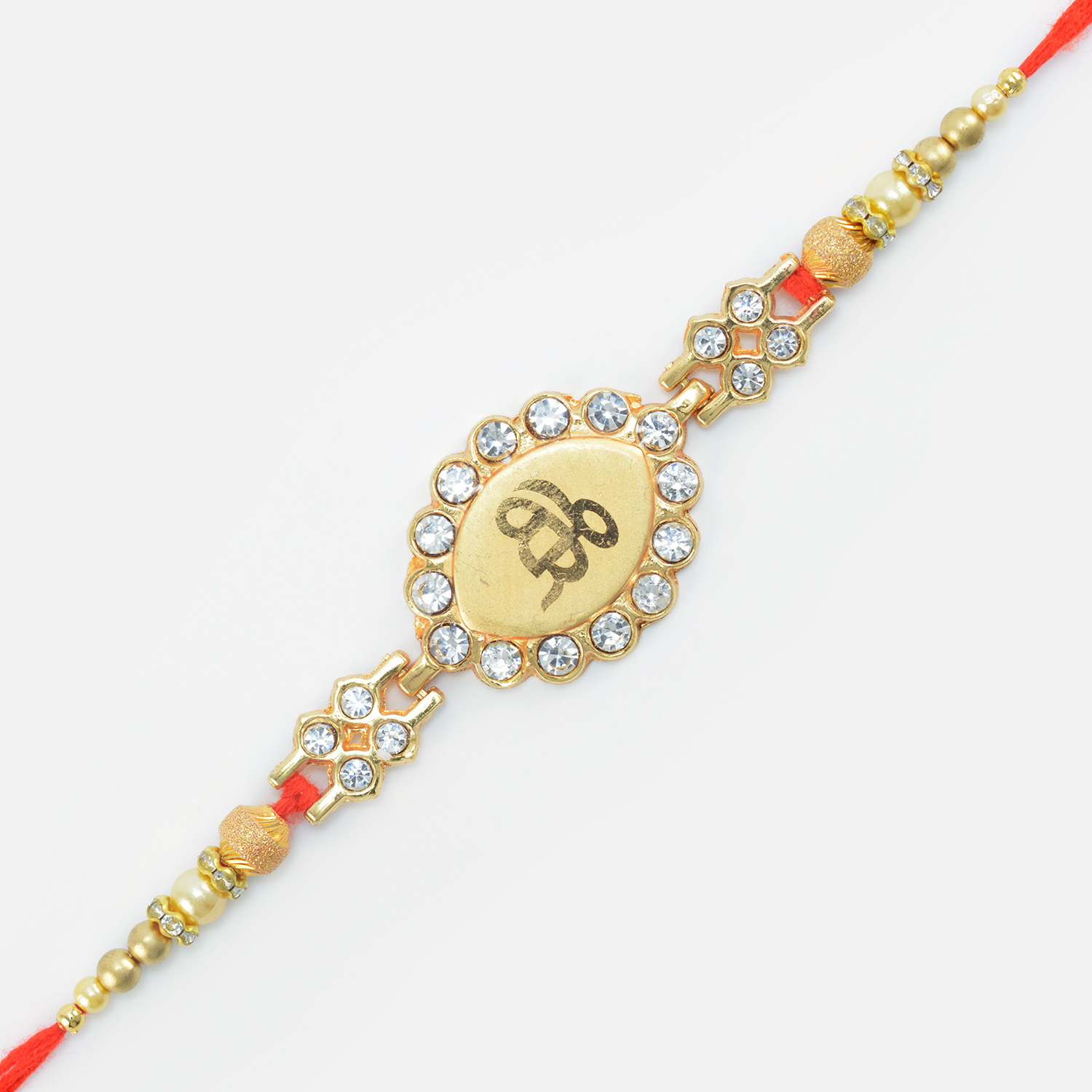 Simple and Amazing Looking Golden Color Sikh Jewel Crafted Rakhi for Veera