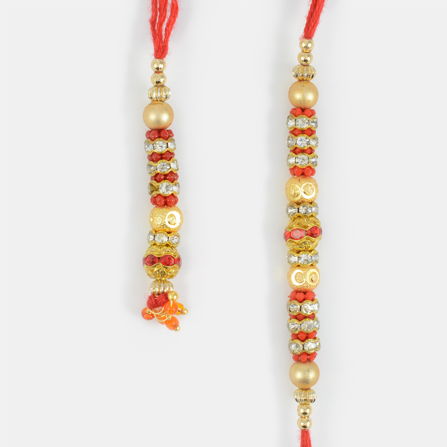 Attractive Golden Pearl and Beads Diamond Rakhi Pair