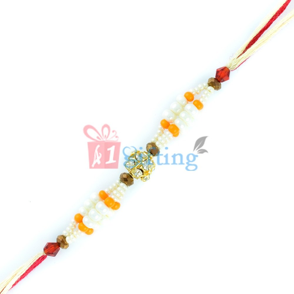 Fabulous Pearl Rakhi with Golden and Crystal Clear Glass Beads