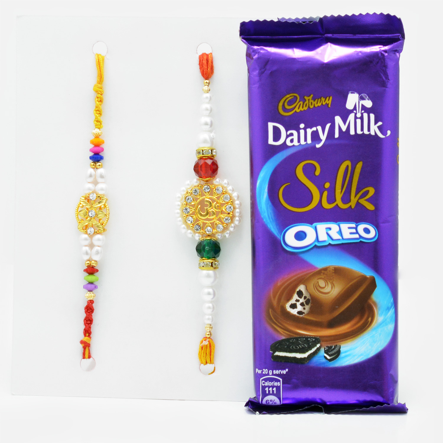 Delicate Golden Rakhi Set of 2 with Delicious Cadbury Dairy Milk Silk Oreo