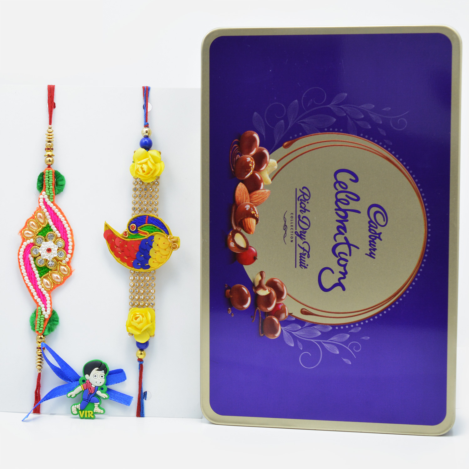 Beauiful Rakhi Set of 3 with Delicious Cadbury Celebration Rich Dry Fruit Chocolate Collection