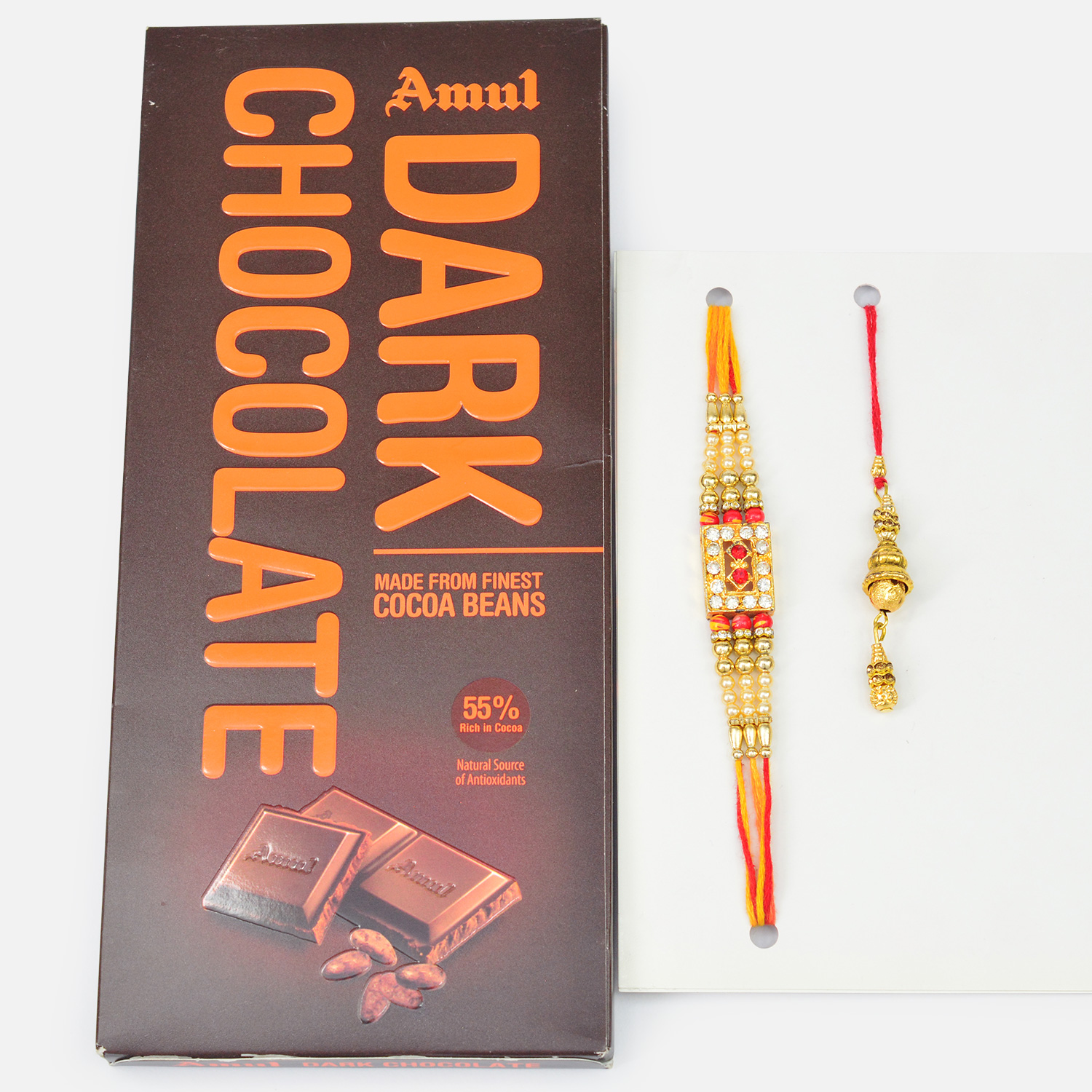 Amul Dark Chocolate with Jewel Studded Multi Threaded Brother and Liner Lumba Rakhi