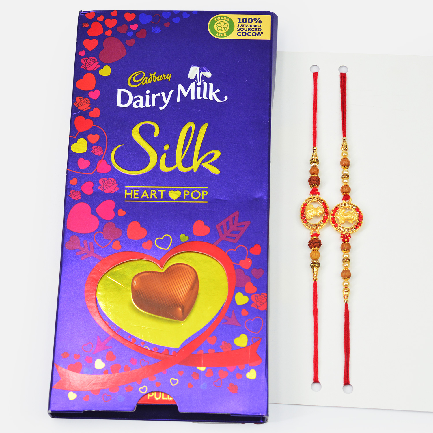 Auspicious Amazing Set of Rakhis with Cadbury Dairy Milk Heart Pop Chocolate