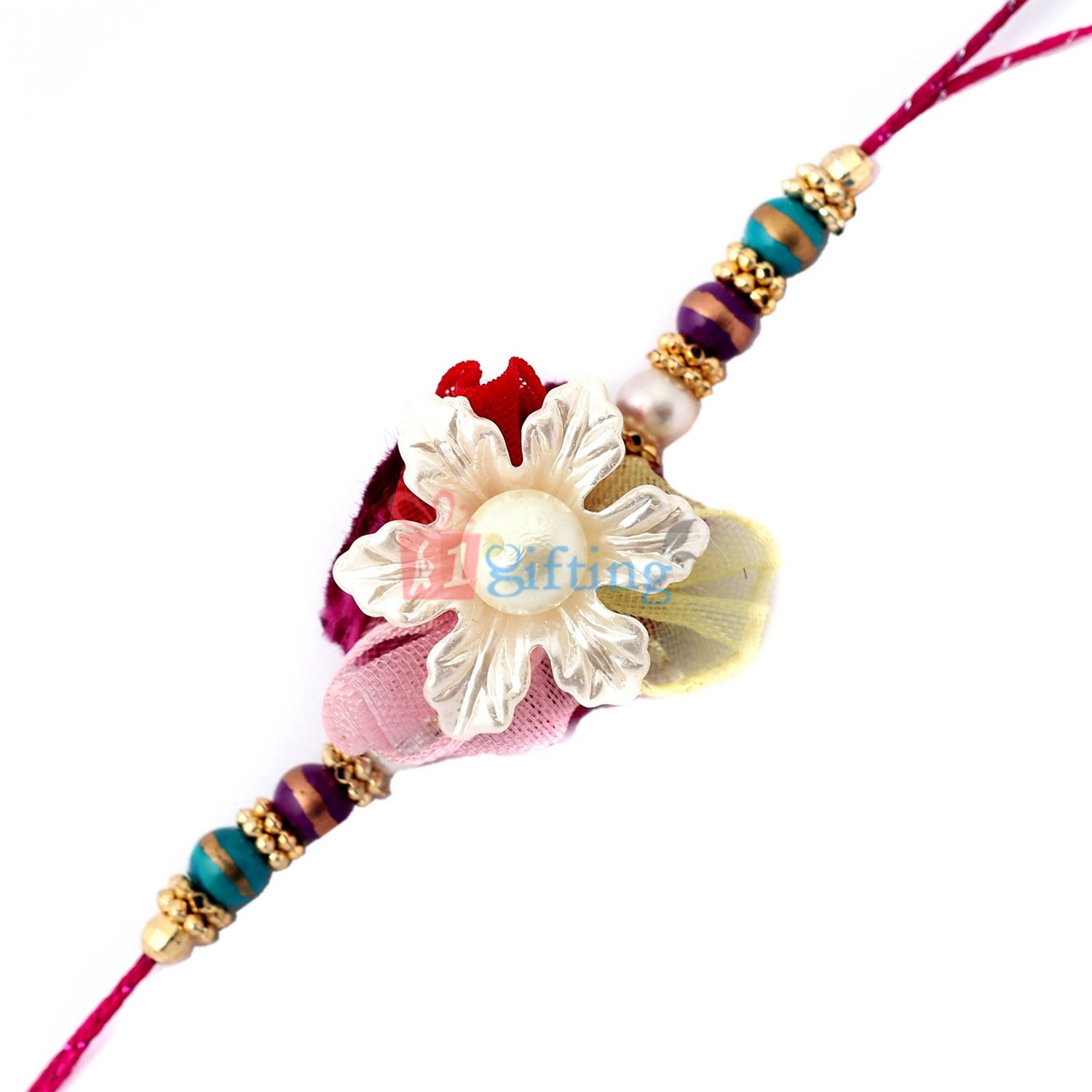 Decent flower with pearl crafted in center and designed with golden beads and gems Rakhi