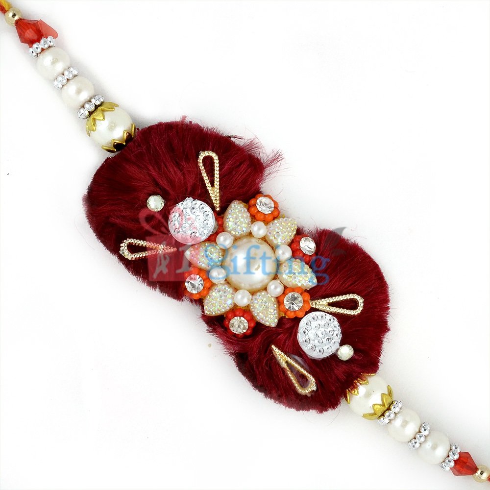 Imposing Maroon Satin Base Fancy Rakhi with Pearl and Glass Beads