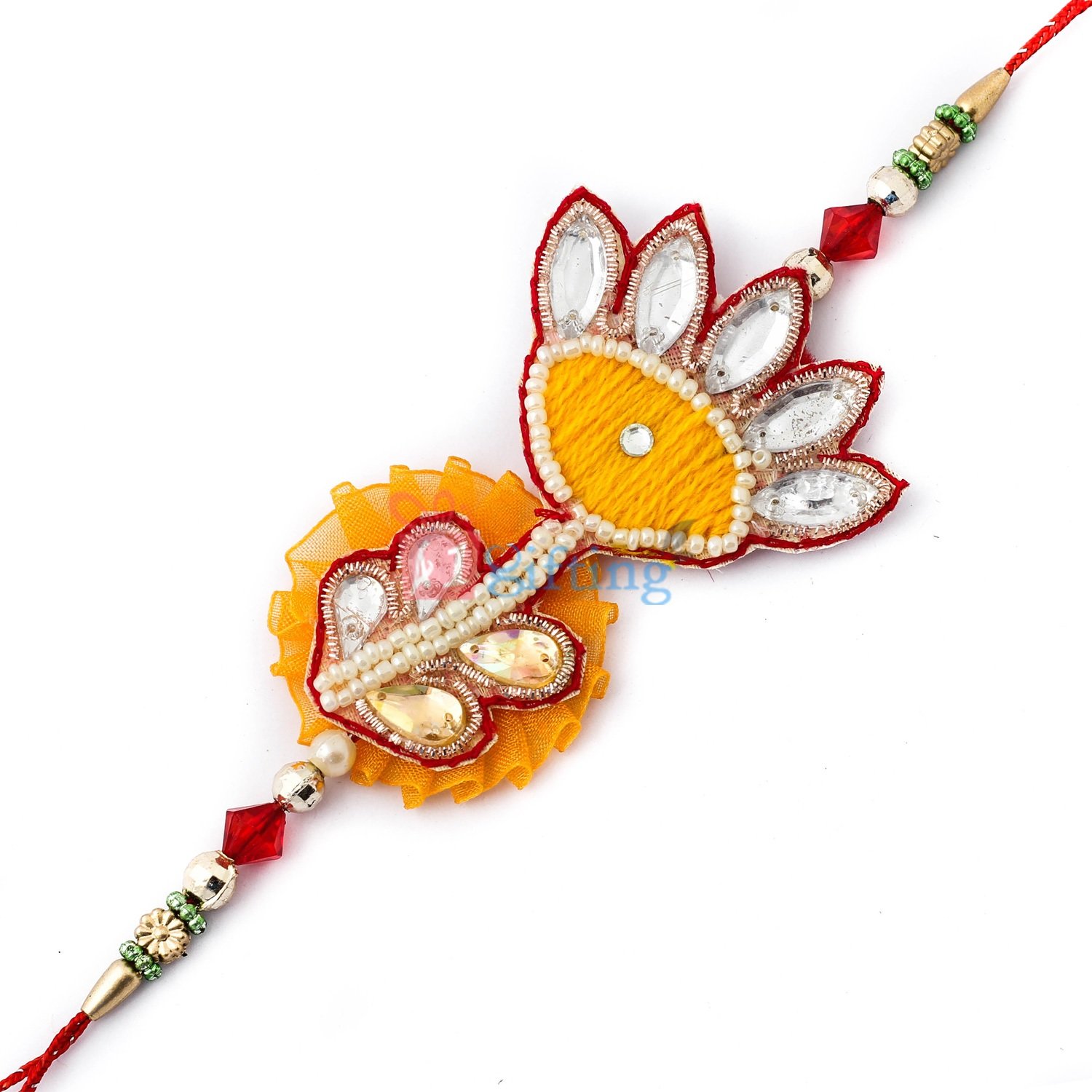 Vintage work of zardosi and crystals with red golden beads in fancy moli Rakhi