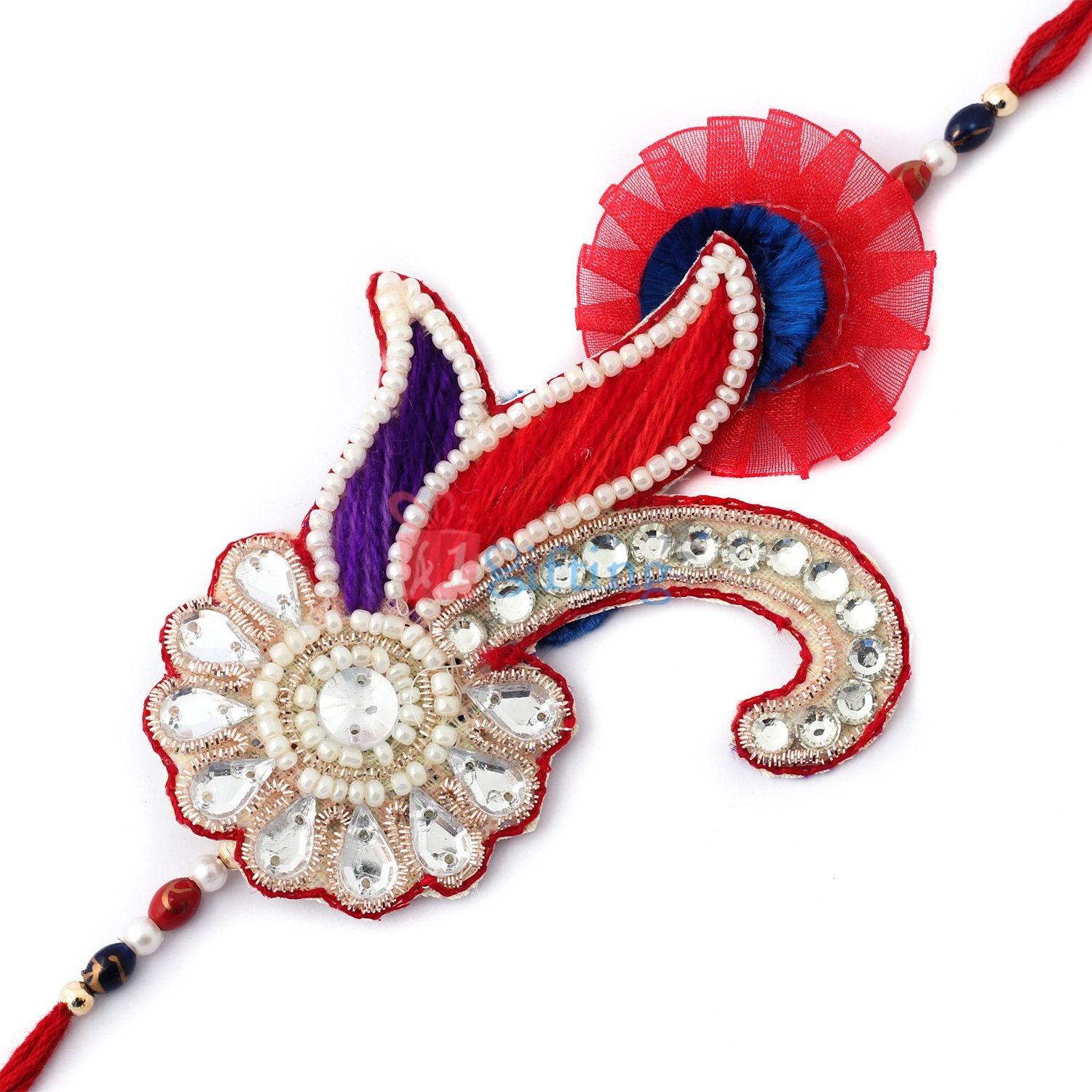 Heritage art of Kundan, Zardosi, Pearl and studded with diamonds in design of peacock fancy Rakhi