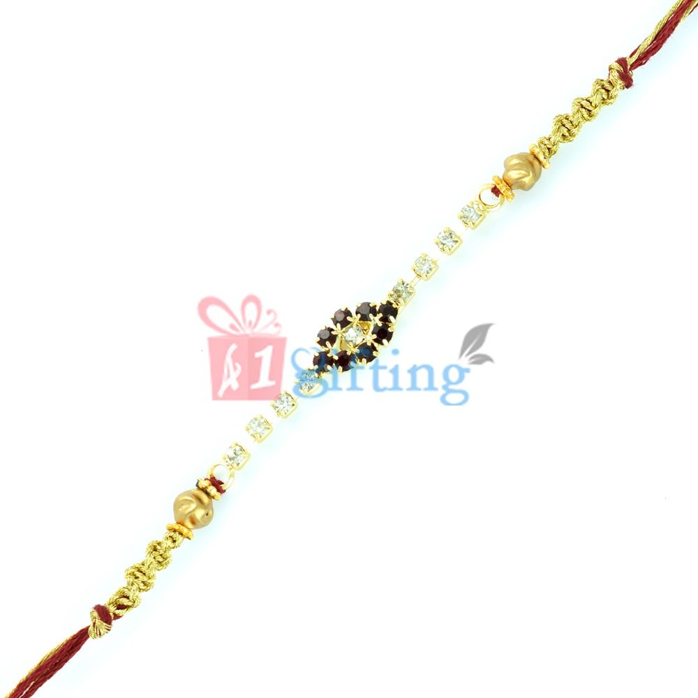 Jewels Rakhi in Golden and Red Dori with White and Black Diamonds