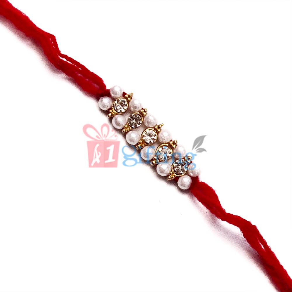 Enticing Diamond and Pearl Rakhi for Brother in Red Woolen Dori