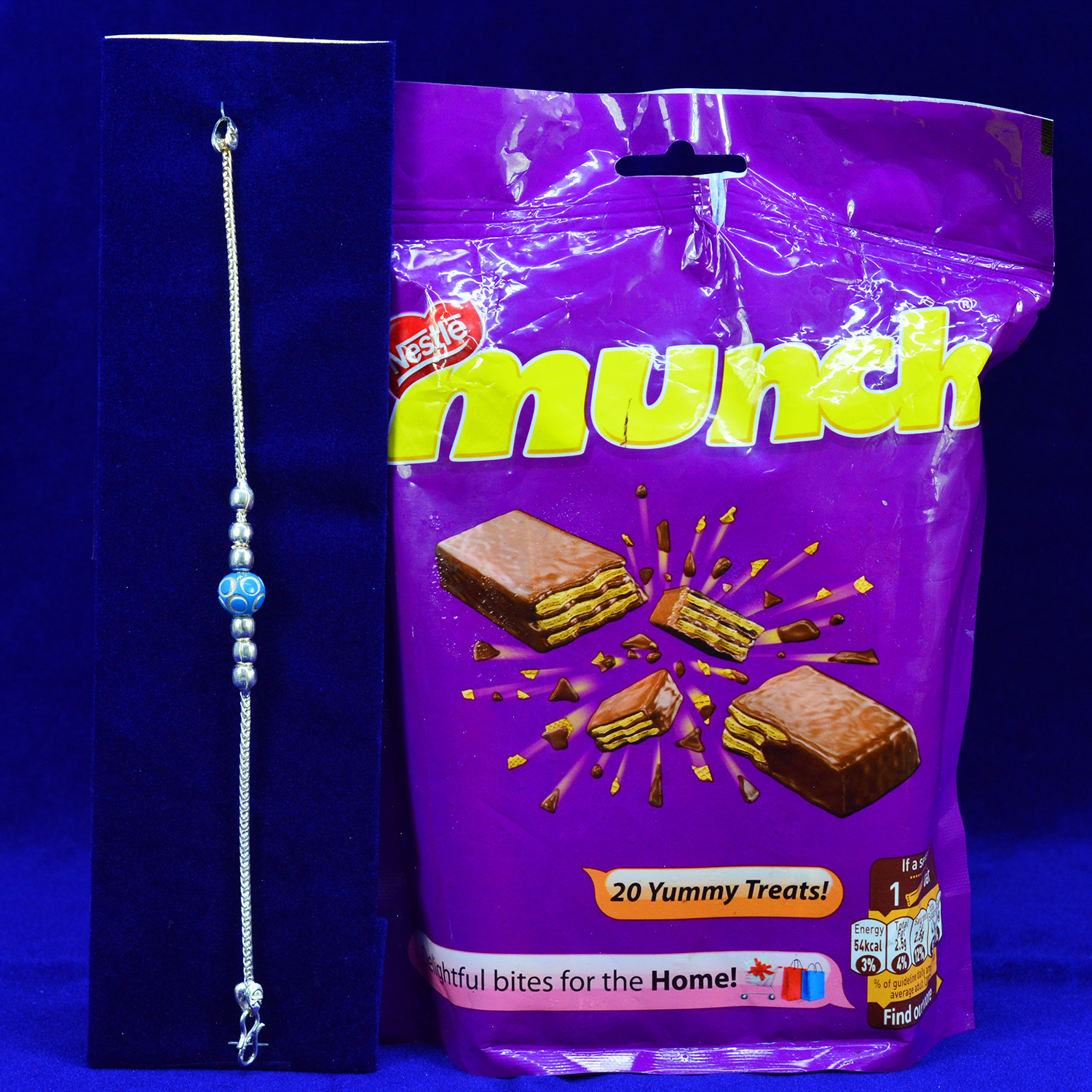 Nestle Munch Chocolate with Simple Amazing Looking Pure Silver Rakhi