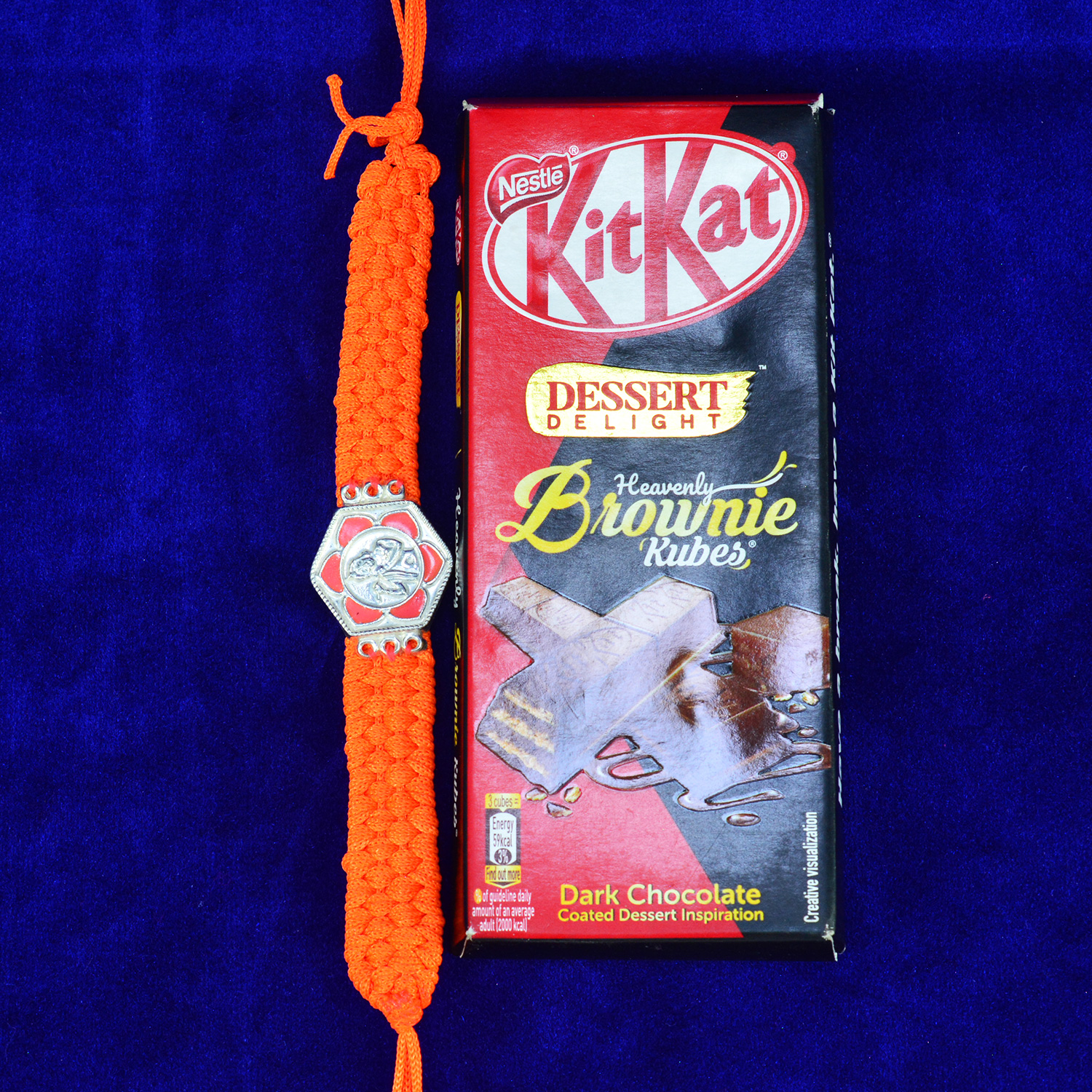 Ganesha Crafted on Hexa Shape Pure Silver Rakhi with Kikat Dessert Delight Chocolate
