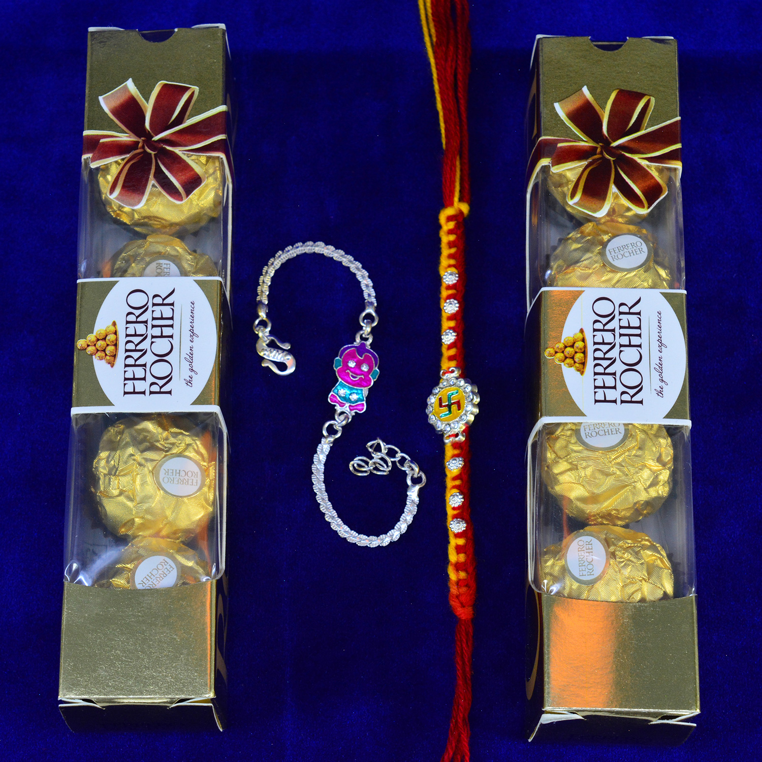 Two Amazing Looking Silver Rakhis with Two Ferrero Rocher 4 Pc Chocolate
