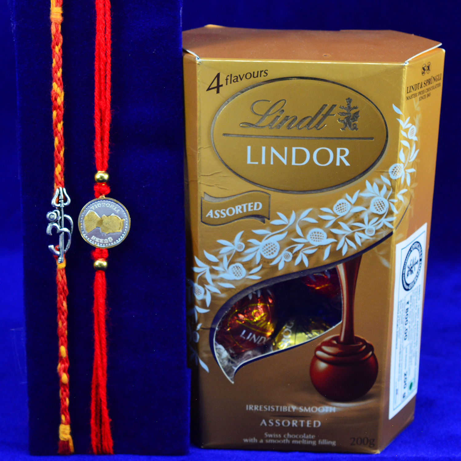 Divine Om and Coin Shape Mauli Thread 2 Rakhis Lindt Lindor Chocolate