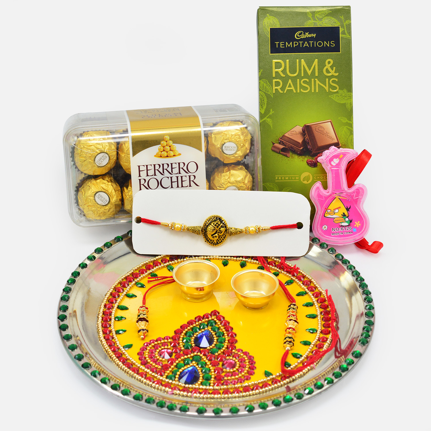 Amazing Yellow Base Rakhi Puja Thali with Chocolates and Ganesha Rakhi for Brother
