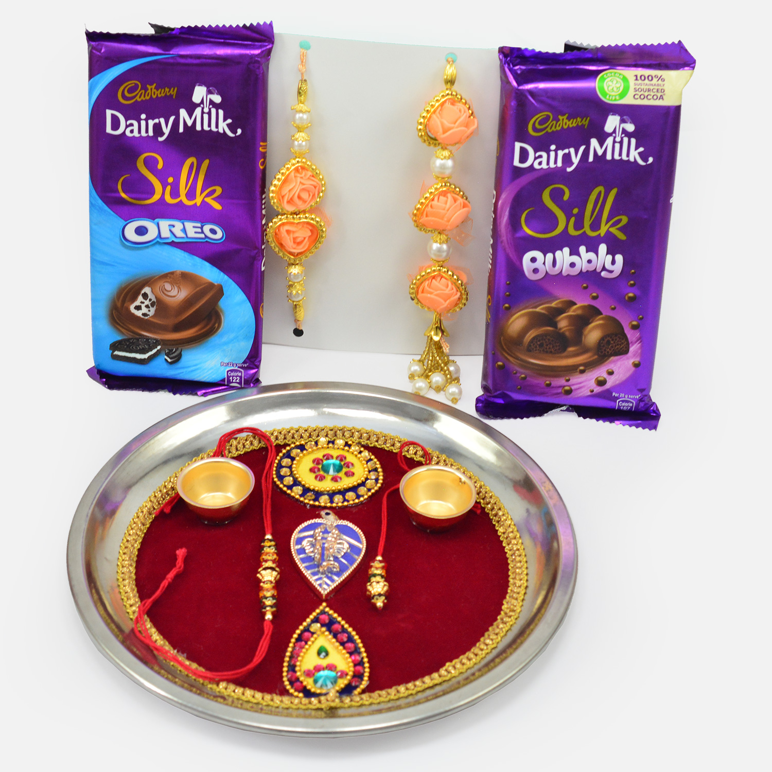 Amazing Rakhis with Silk Chocolates and Maroon Base Ganesha Rakhi Thali