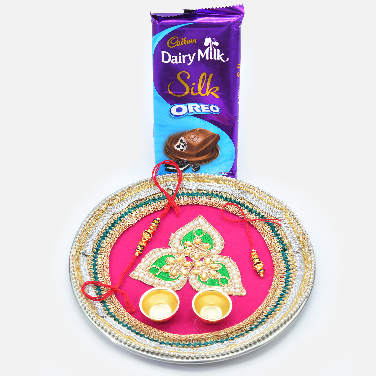 Silk Oreo Chocolate with Golden Couple Rakhis and Pink Base Rakhi Puja Thali