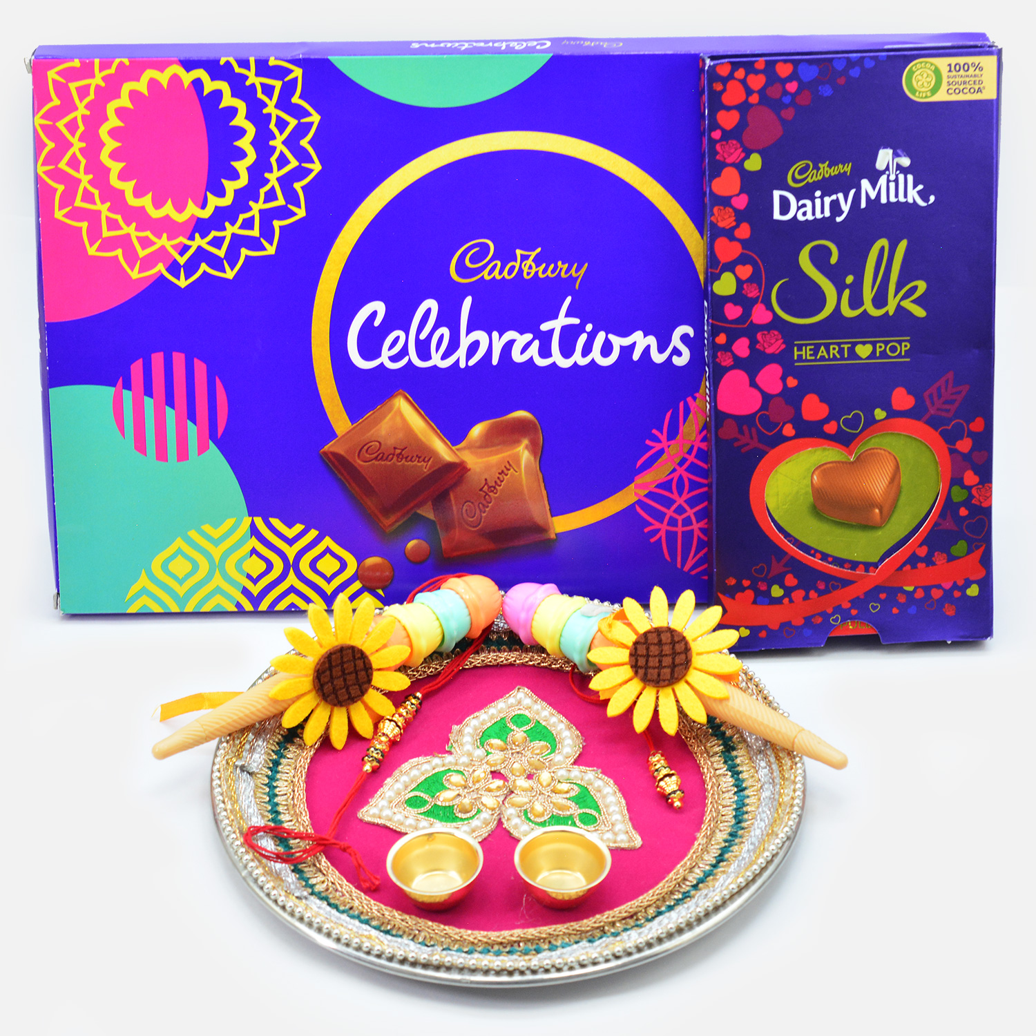Cadbury Celebration and Silk Chocolates with Amazing Toy Kids and Bhaiya Bhabhi Rakhis along with Pooja Thali