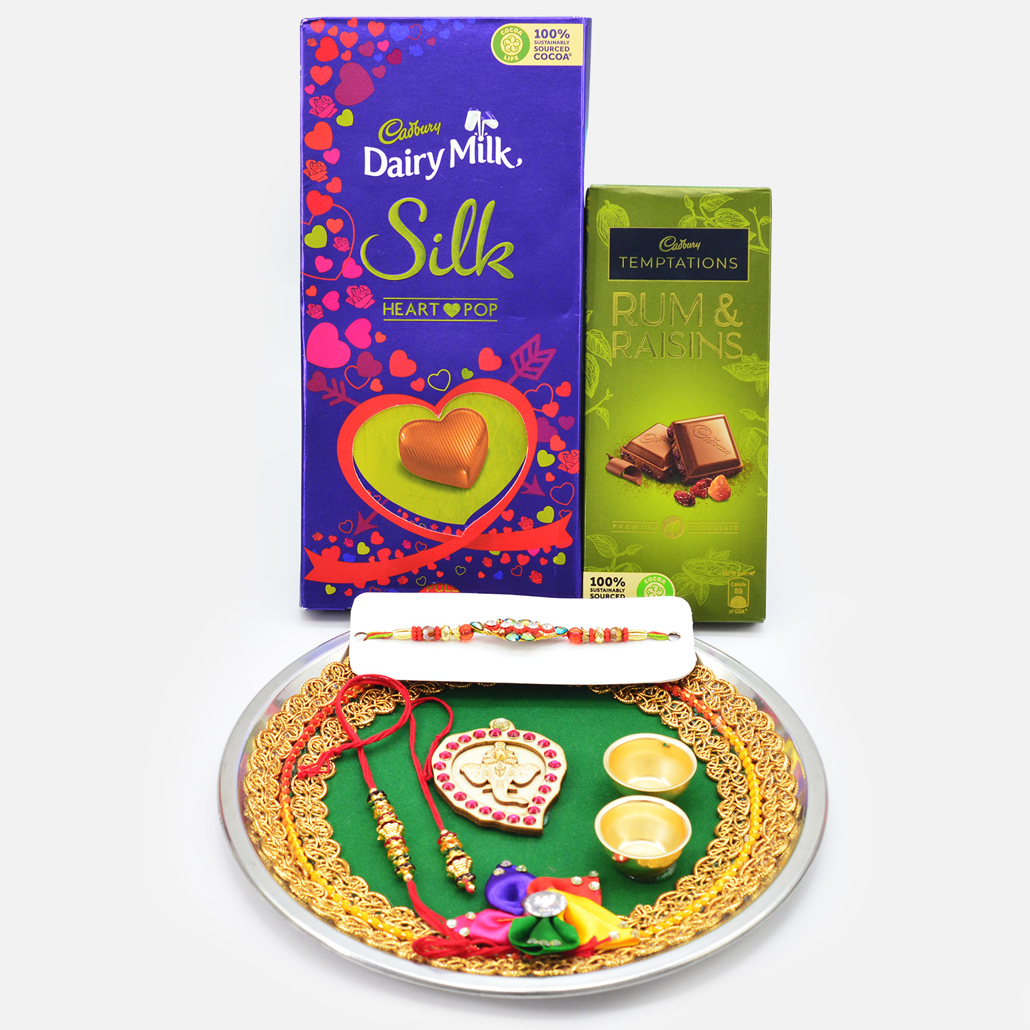 Silk and Rum Raisins Cadbury Chocolates with Awesome Rakhis and Ganesha Puja Thali