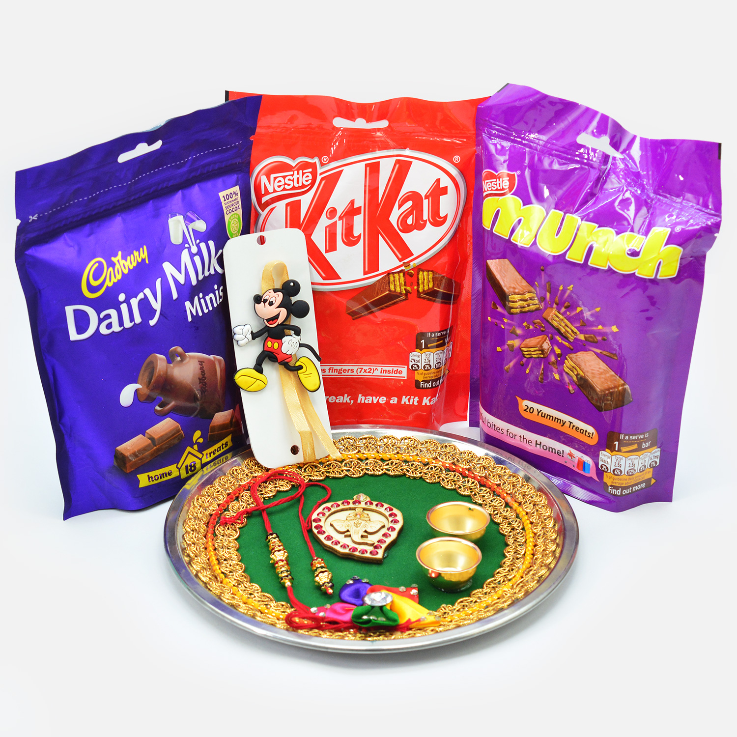 Dairy Milk Kitkat and Much Pack of Chocolates Hamper with Rakhis and Divine Puja Thali
