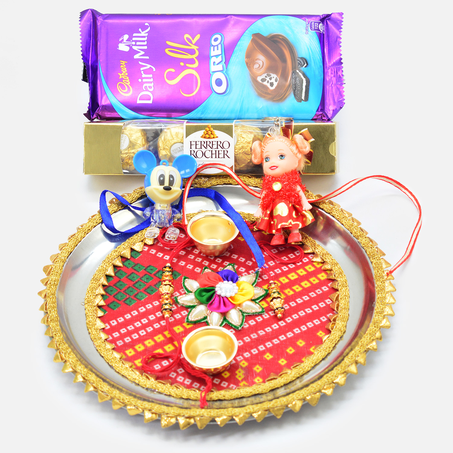 Oreo and Ferrero Rocher Chocolates Pack with Kids and Couple Rakhis and Rajasthani Fabric Designer Thali
