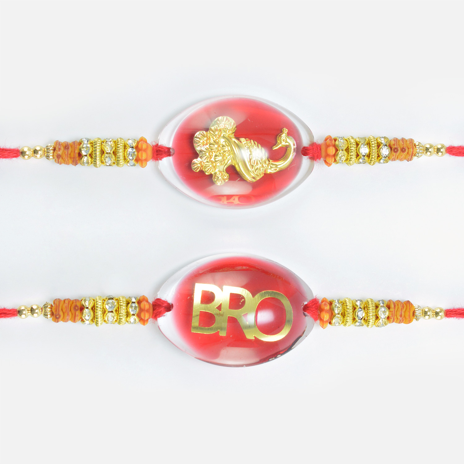 Golden Peacock and Bro Written in Transparent Glass on Red Base Amazing Rakhi Set