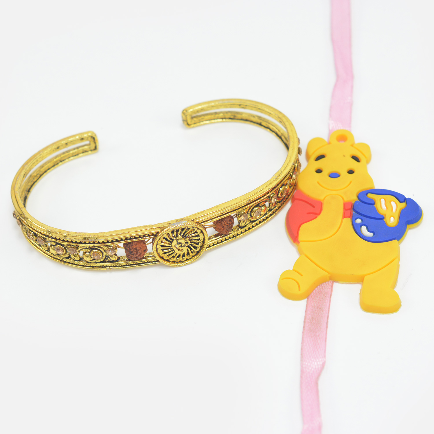 Golden Handcrafted Rakhi Bracelet for Brother with Kid Rakhi of Pooh Cartoon