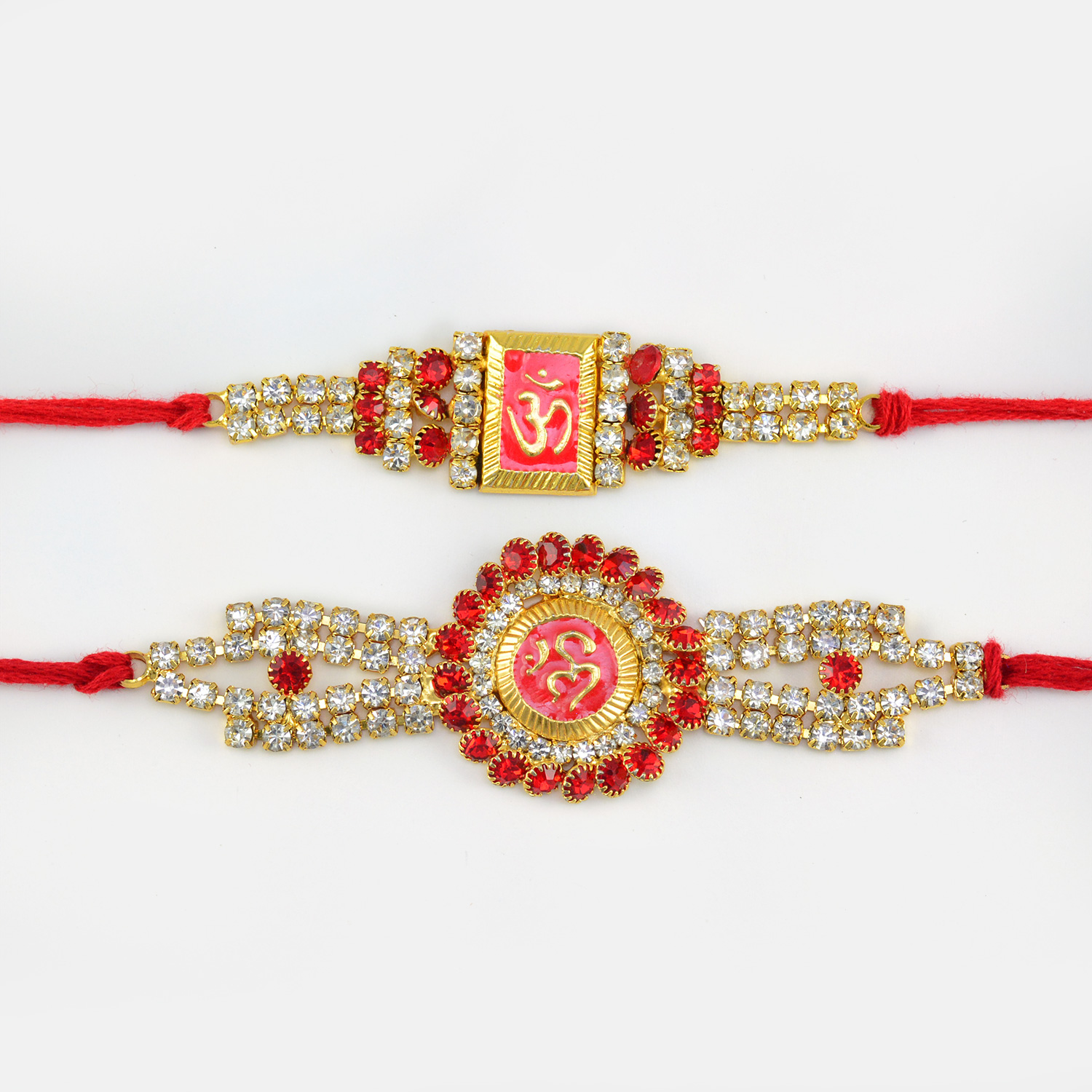 Golden Om Rakhi with Red Diamond Set of 2