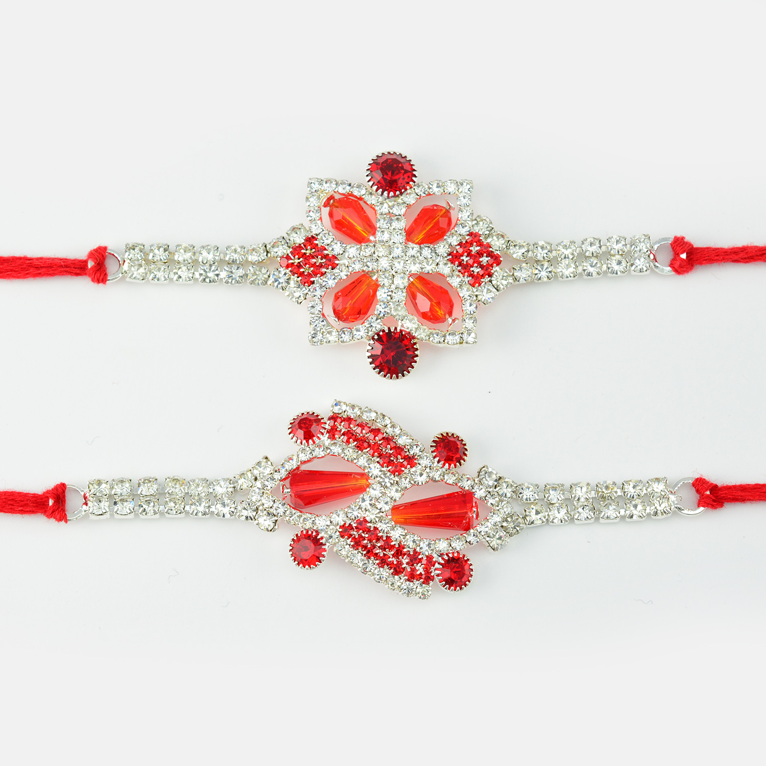 Silver And Red Color Diamonds Rakhi Set of 2