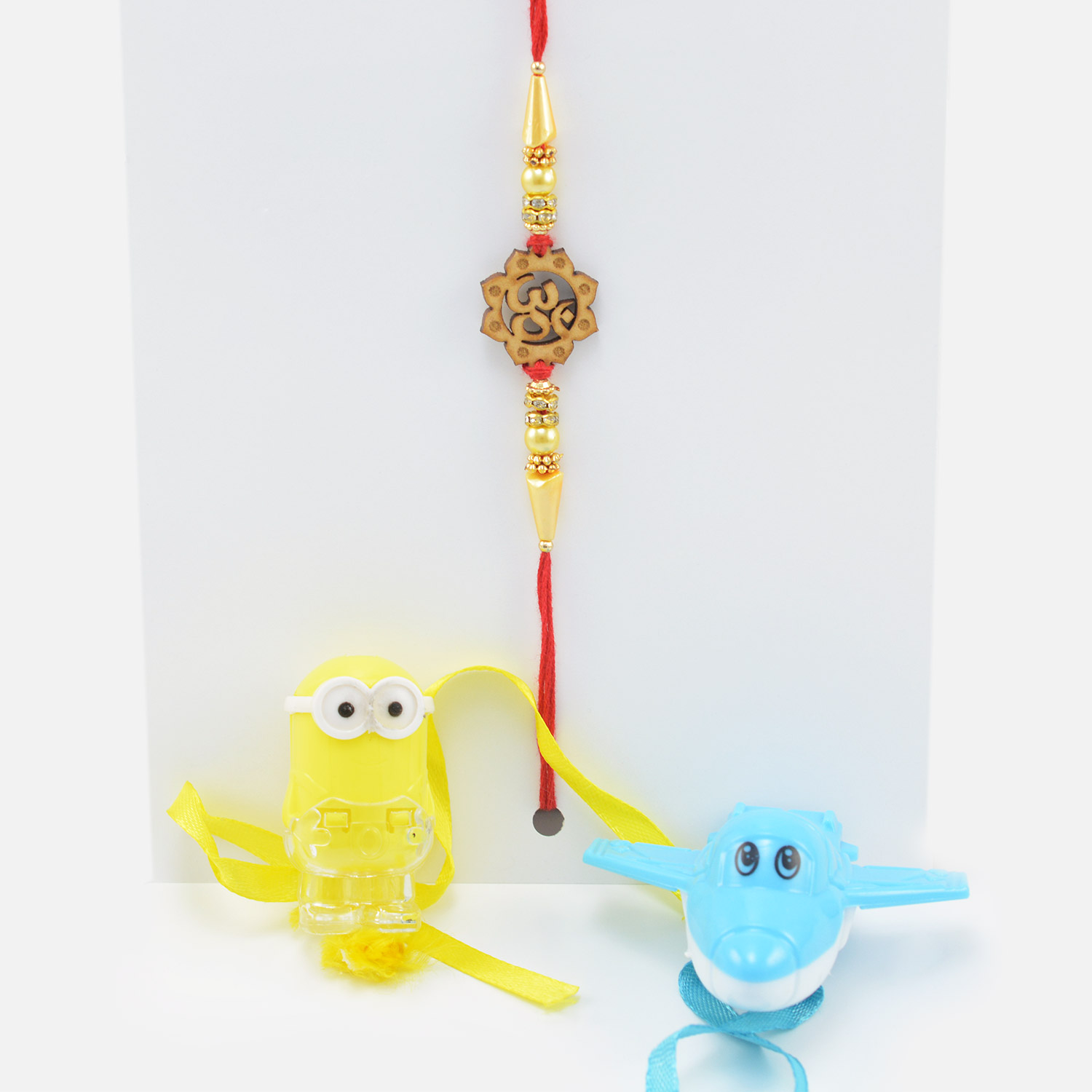 Om Rakhi for Brother with Minon and Airoplane Toy Rakhi for Kid