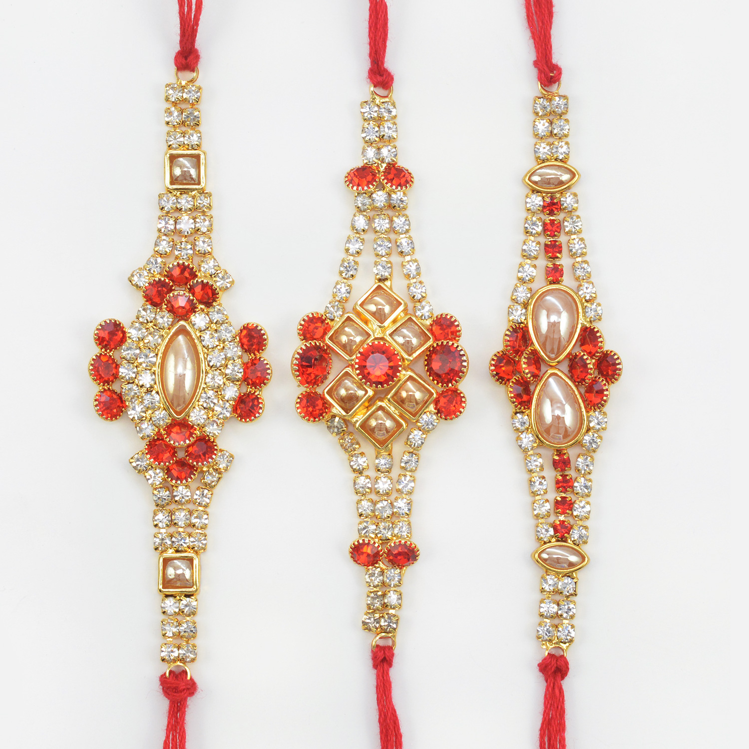 Pearl and Jewel Studded Magnificent Dazzling Rakhis Set for Three Jewel Rakhis