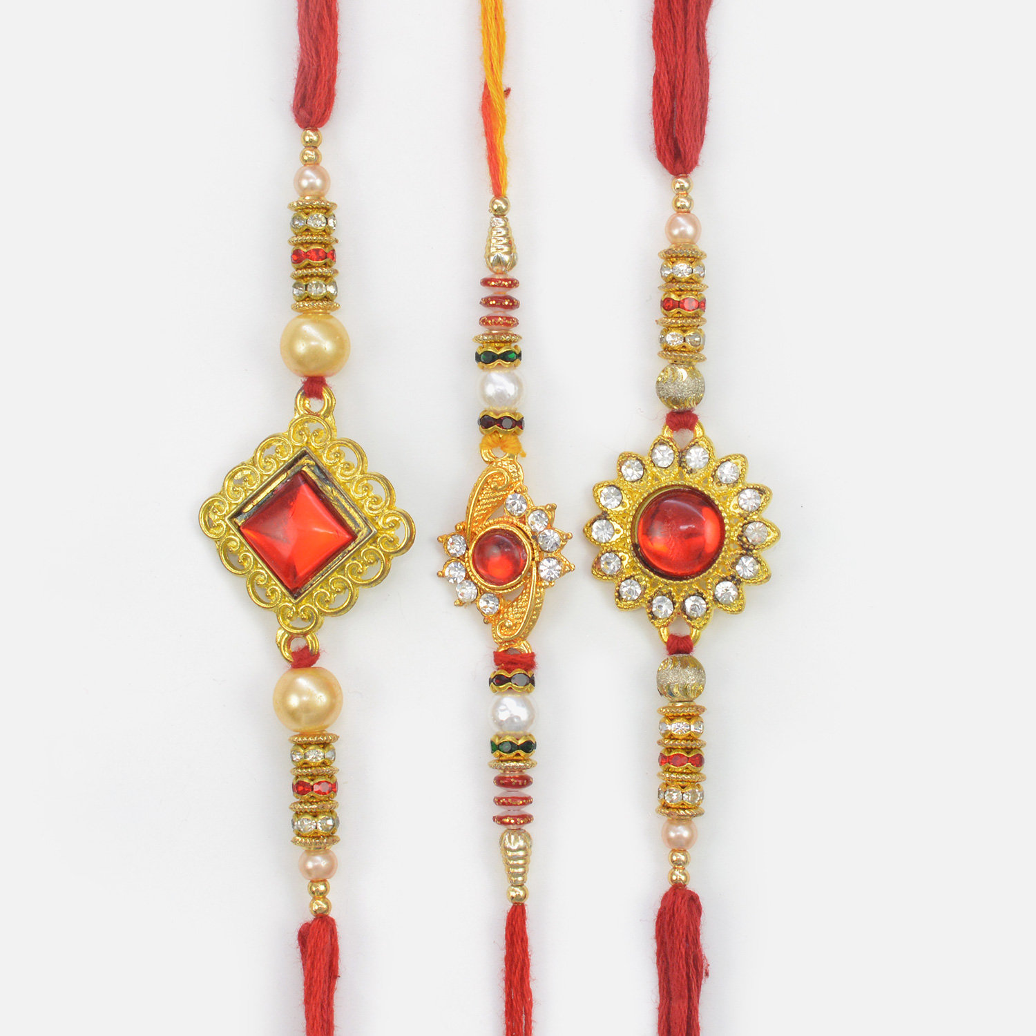 Red Stone Kundan Studded in Mid of Golden Base Three Attractive Rakhis for Brother