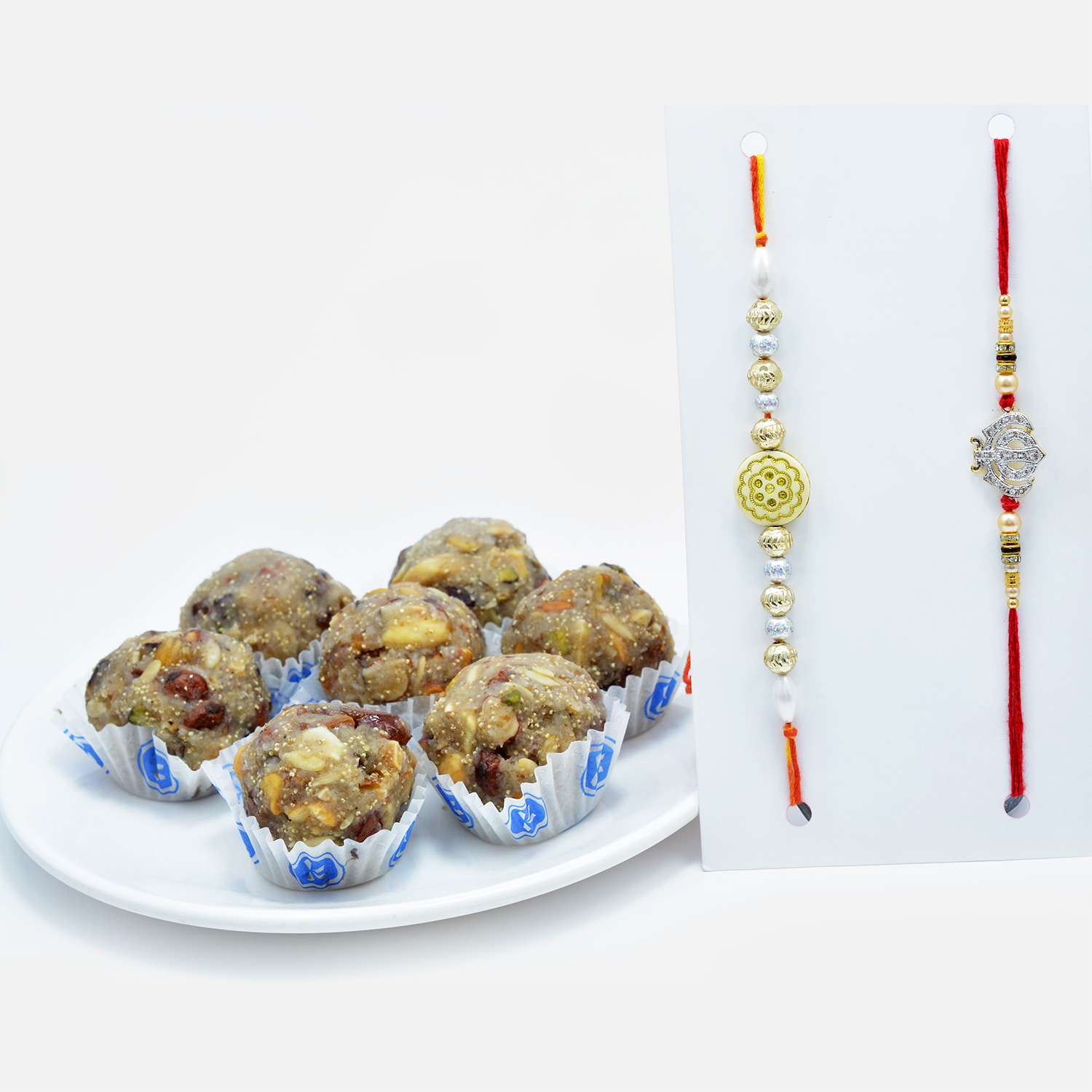 Mauli Threaded Sikh Rakhi and Gold-Silver Beads Rakhi Set of 2 with Dry Fruit Laddu