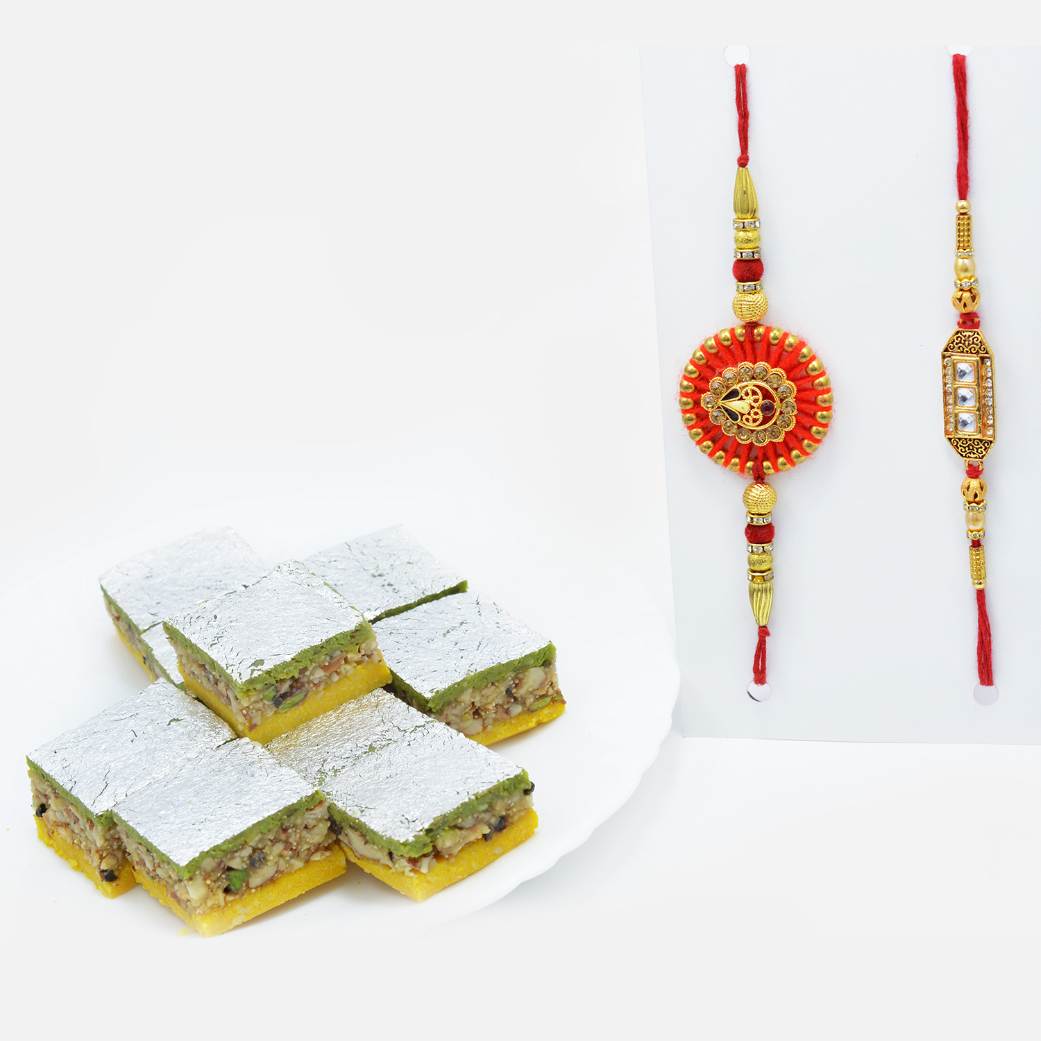 Tempting Pista Badam Barfi with Attractive Rakhi Set of 2