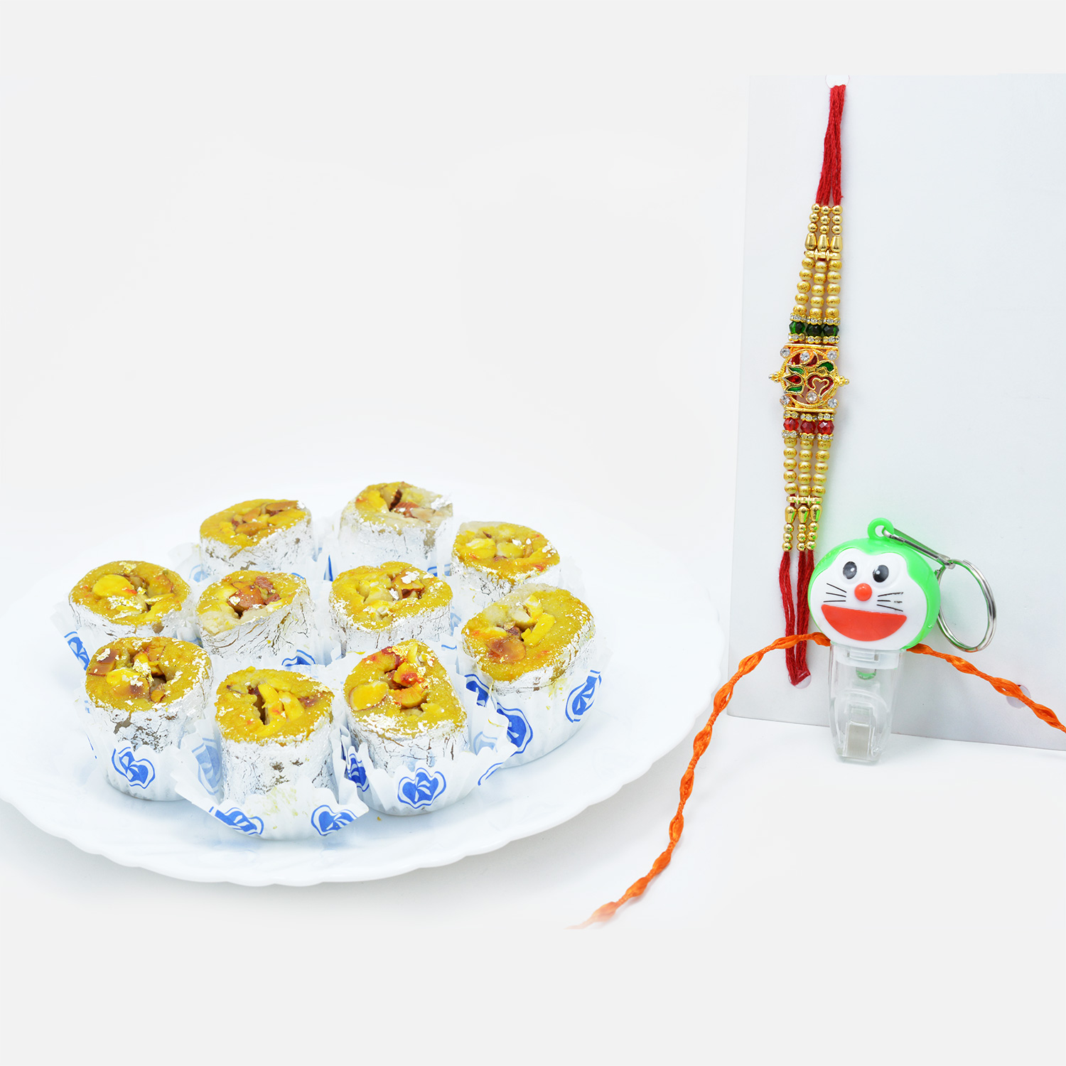 Led Doraemon and OM Rakhi Set of 2 with Flavourful Kaju Honey Dew