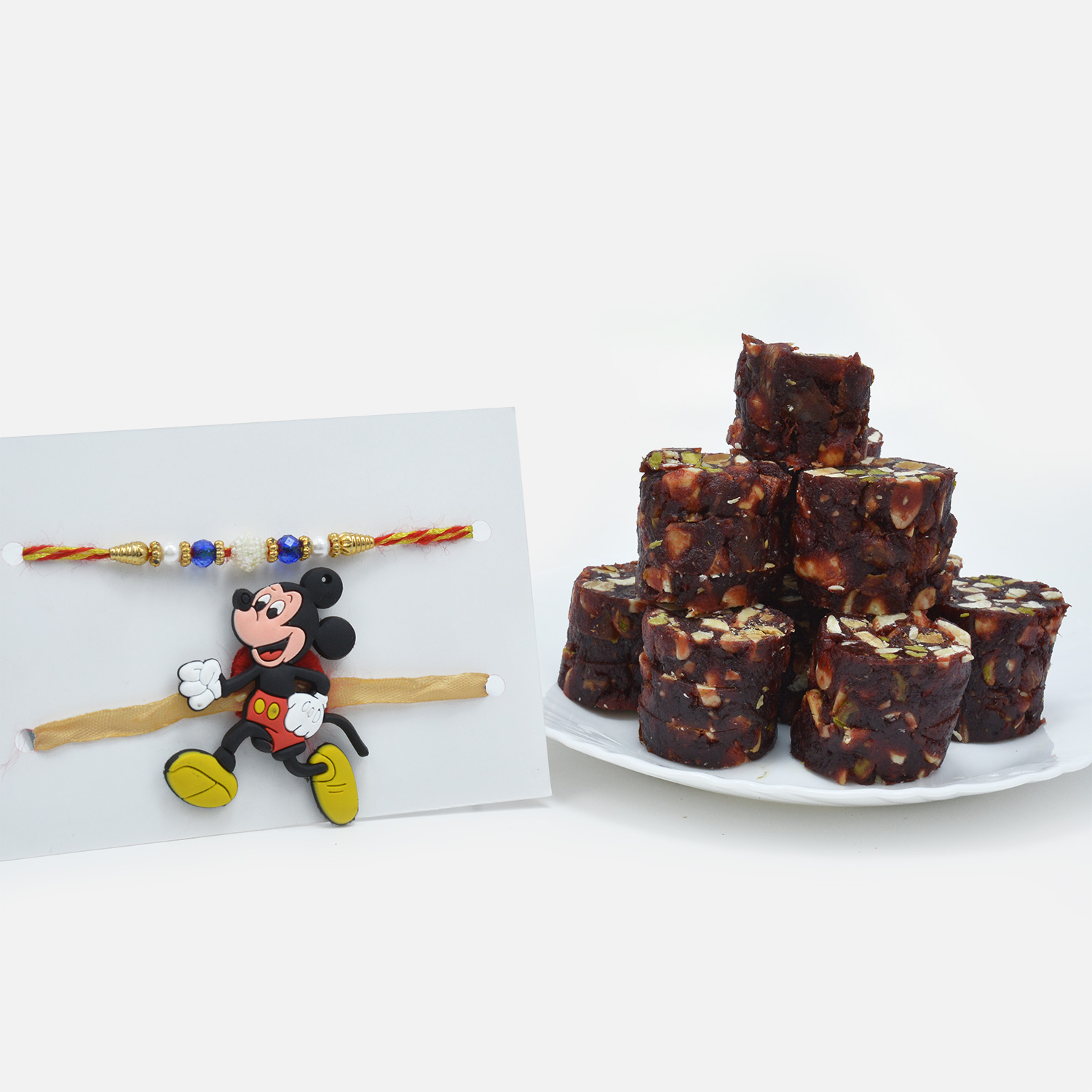 Mickey Mouse and Elegant Mauli Threaded Rakhi Set with Kanha Khajoor Dryfruit