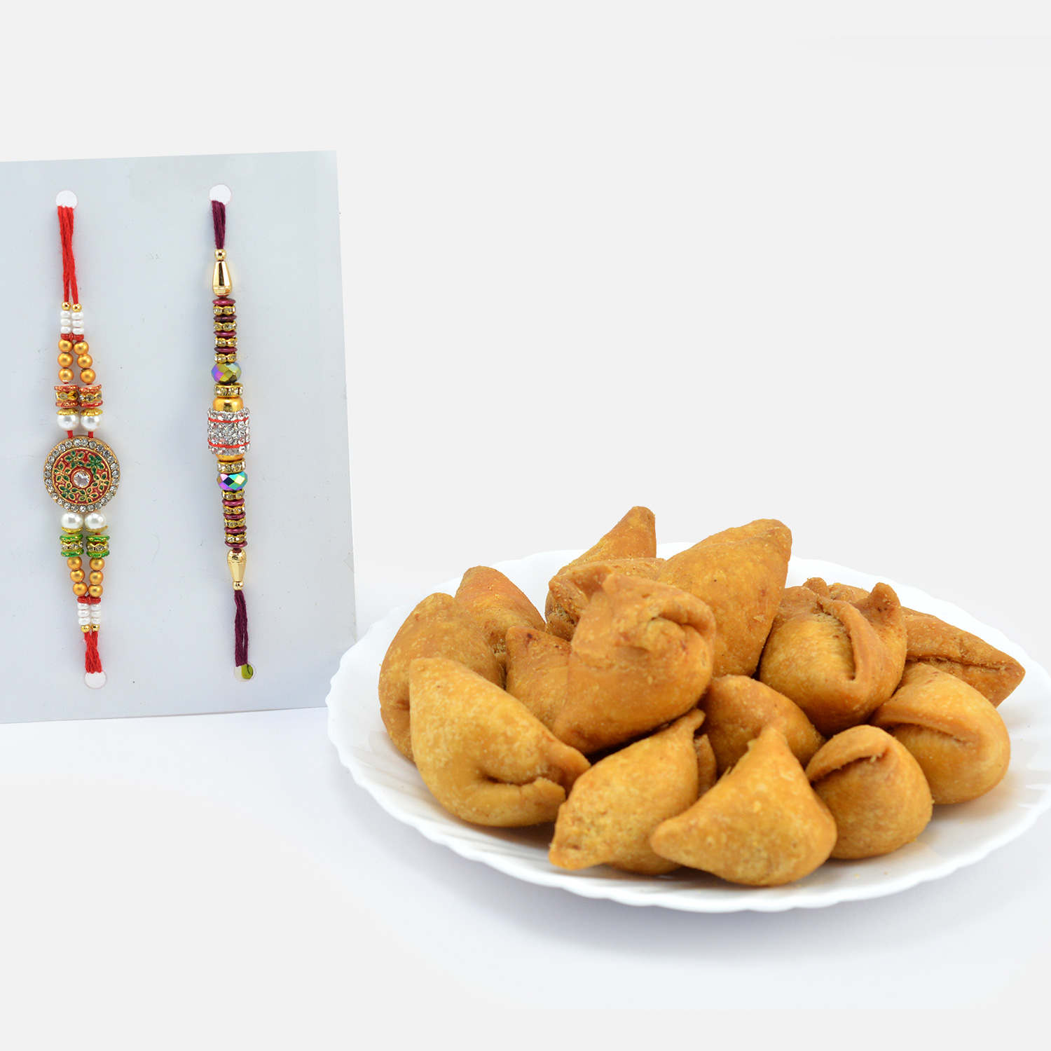 Thread and Pearl Designer Rakhis for Brother with Sweet Crispy Namkeen Small Samose