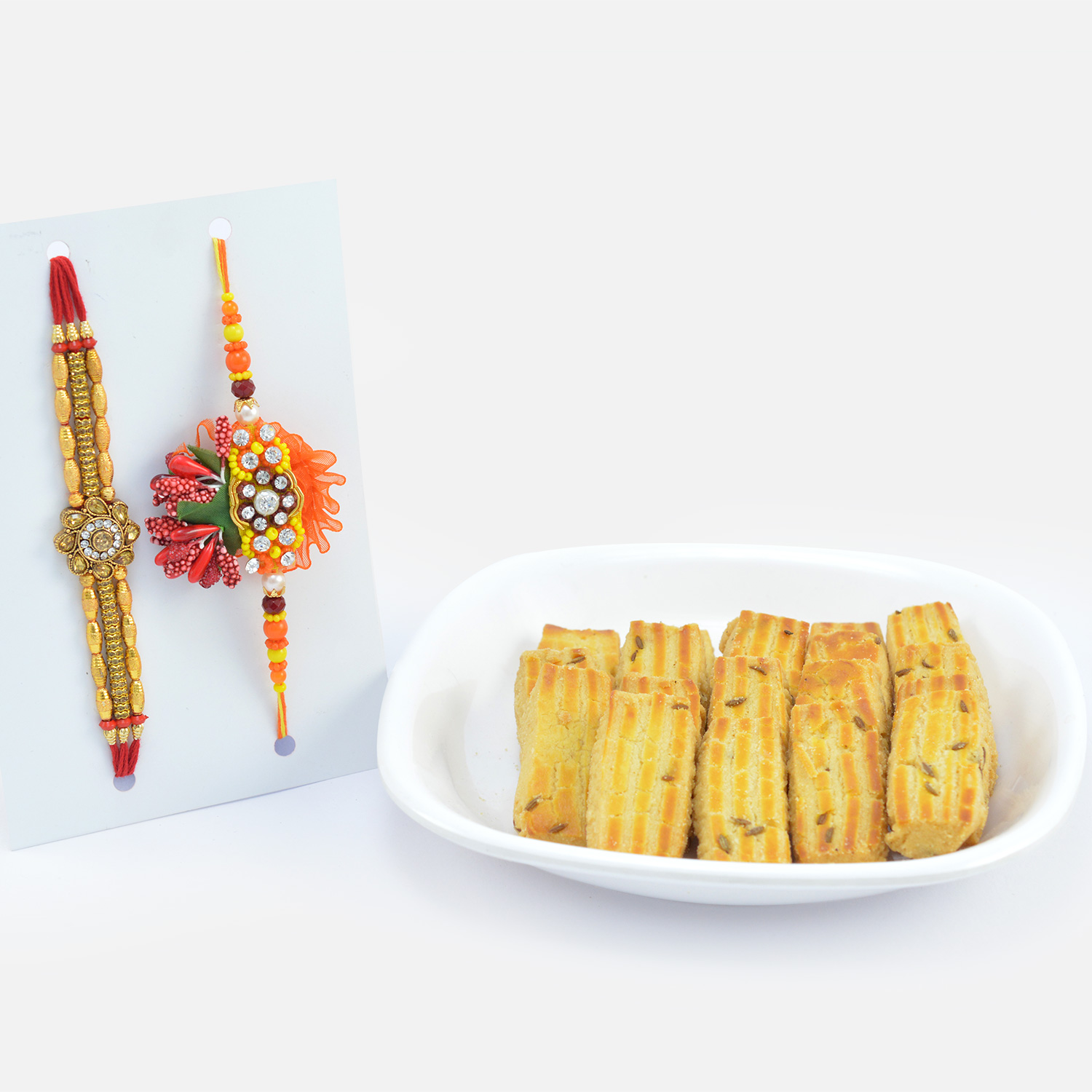 Beaded Flower Design and Zardosi Work Rakhis for Brothers with Soft Ajwain Biscuits