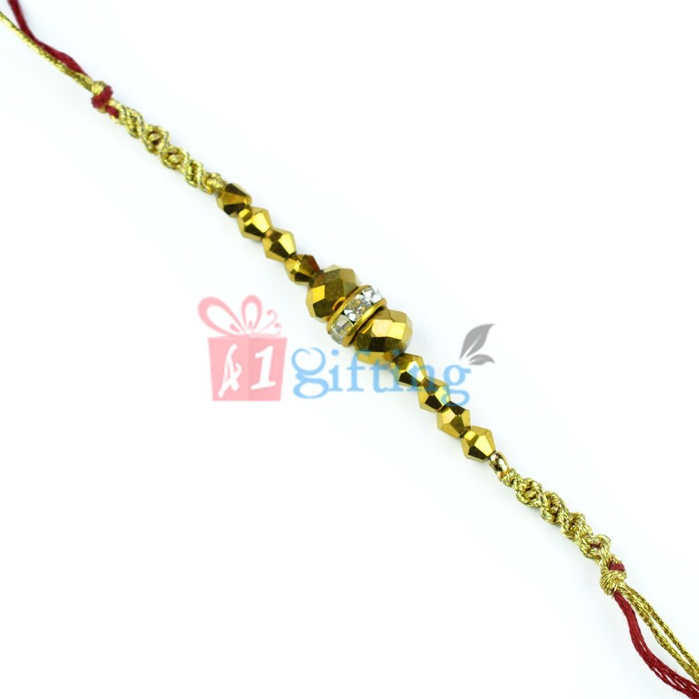 Pearl and Golden Beaded Special Thread Rakhi with Central Designer Bead
