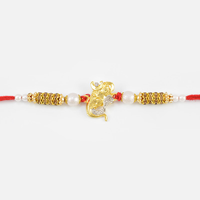 Golden Ganesha Mauli String Pearl Diamond Rakhi