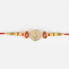 Silver OM Rakhi with Golden Beads and Diamonds