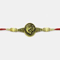 Graceful Golden Ganesha Rakhi with Pearls and Diamonds