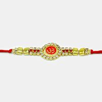 Floral Shape Om Rakhi with Golden Work and Silver Diamonds