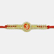 Floral Shape OM Rakhi with Silver and Red Diamond Work