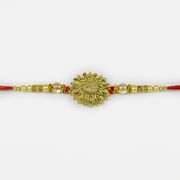 Floral Shape Golden Om Rakhi with Pearls and Diamonds