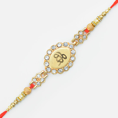 Simple and Amazing Looking Golden Color Sikh Jewel Crafted Rakhi for Veera