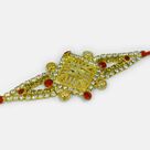 Awesome Looking Silver and Red Jewel Studded Pearl Golden Swastika Rakhi
