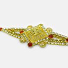 Awesome Looking Silver and Red Jewel Studded Pearl Golden Swastika Rakhi