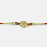 Golden Emerged Om Surrounded with Jewel Special Pearl God Rakhi for Brother