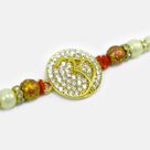 Golden Emerged Om Surrounded with Jewel Special Pearl God Rakhi for Brother