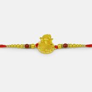 Awesome Looking Golden Color Emerged Divine Ganesha Rakhi for Brother